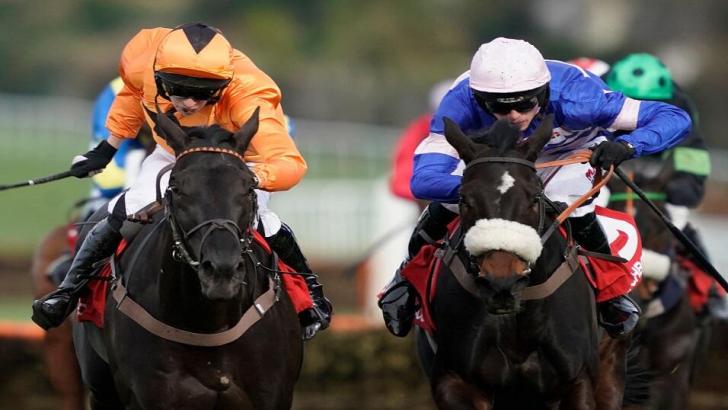 Harry Cobden riding Malaya (blue silks) 